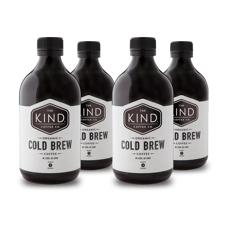 Four bottles of The Kind Coffee Co. Organic Cold Brew Coffee on a white background