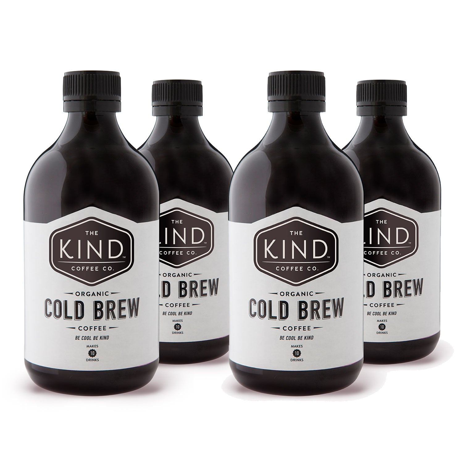 Four bottles of cold brew coffee with black labels, branded 'The Kind Coffee Co.'